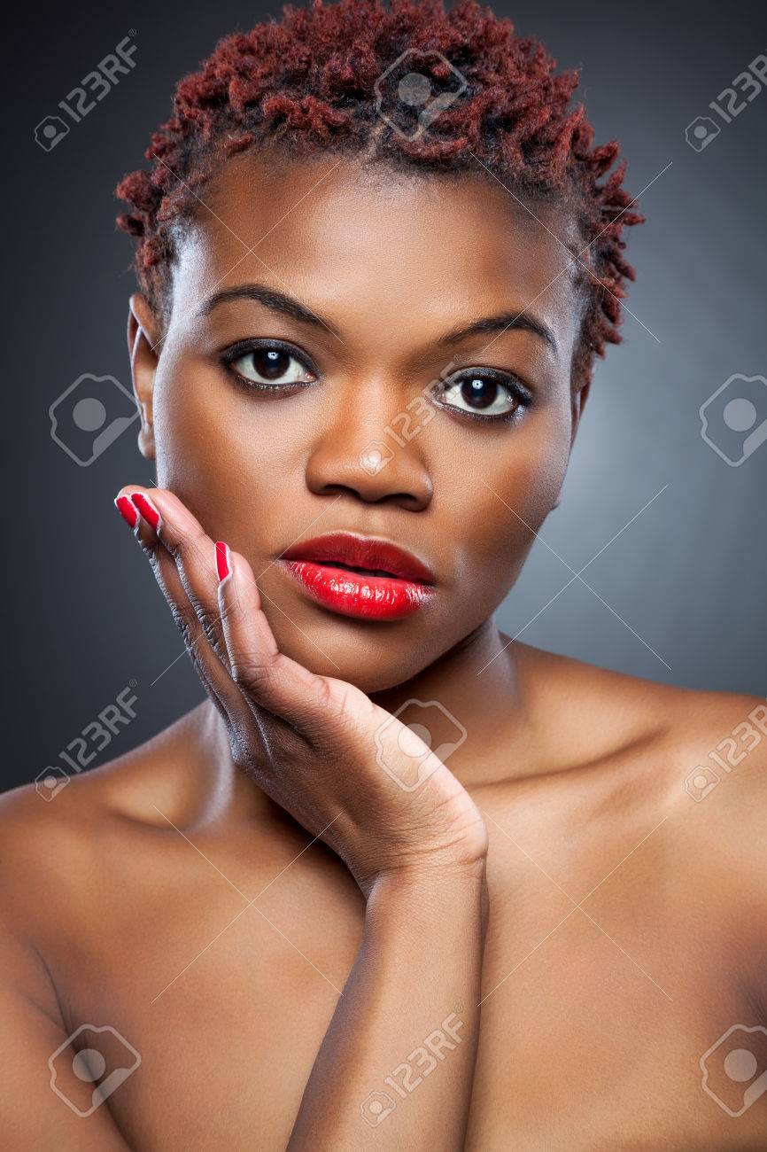 Black Beauty With Short Spiky Red Hair Stock Photo Picture And
