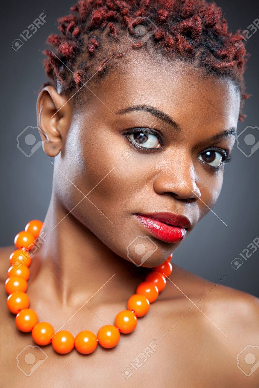 Black Beauty With Short Spiky Red Hair Stock Photo Picture And
