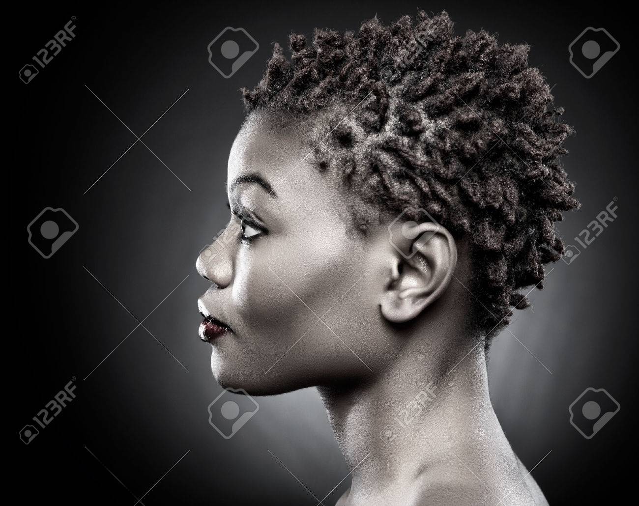 Black Beauty With Short Spiky Red Hair Stock Photo Picture And