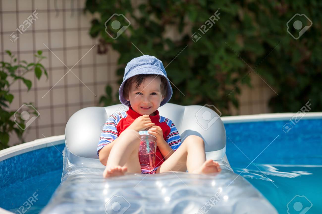 sweet little boy swimming