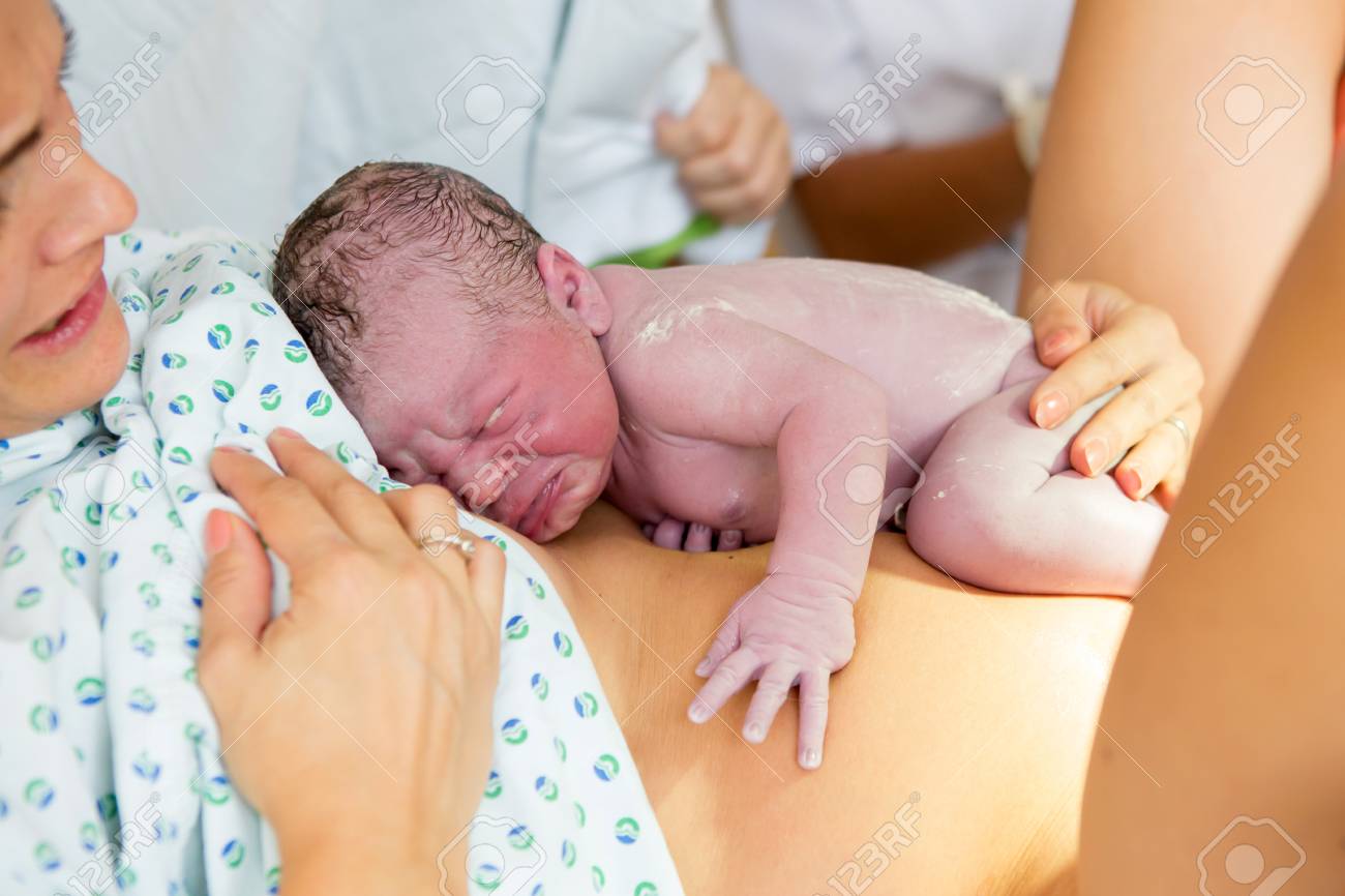 Happy Mom Having Her Baby Skin To Skin First Seconds After Birth Stock Photo Picture And Royalty Free Image Image 85538899