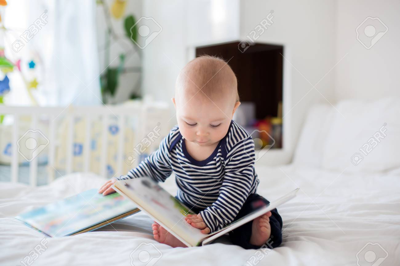 baby reading book
