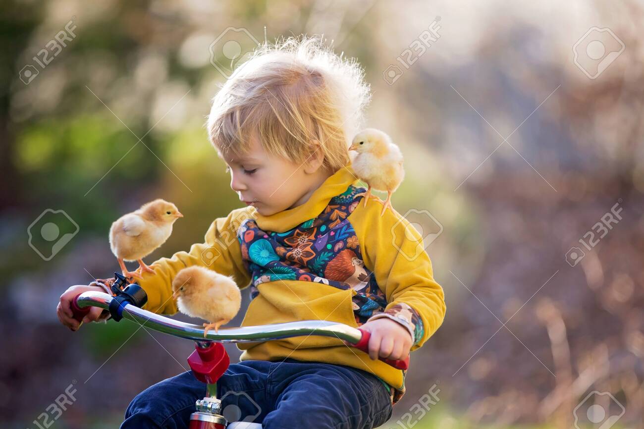 baby riding tricycle