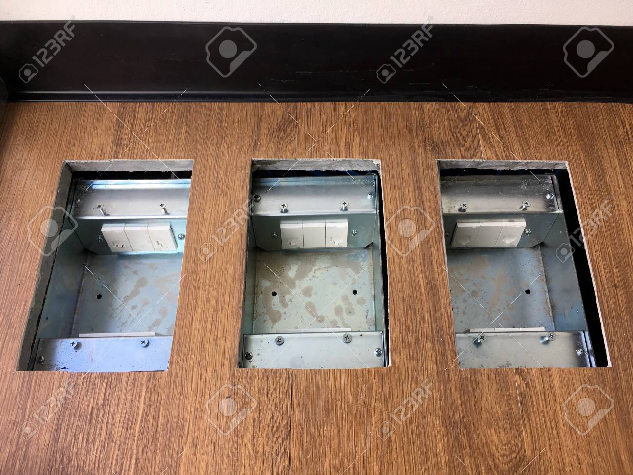 Floor Plug Pop Up Plug In Metal Cover Installed In Wooden Floor