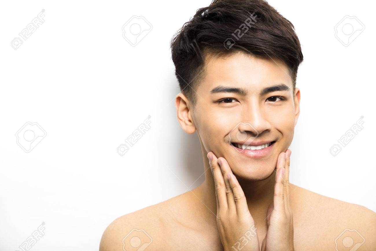 Closeup portrait of attractive young man face - 52000853 Closeup portrait of attractive young man face - 52000853