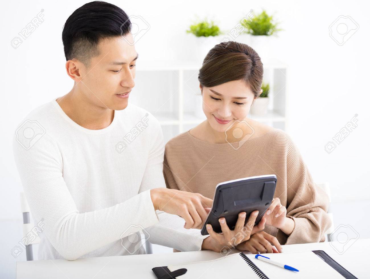 husband and wife with family finance concept - 53696998 husband and wife with family finance concept - 53696998