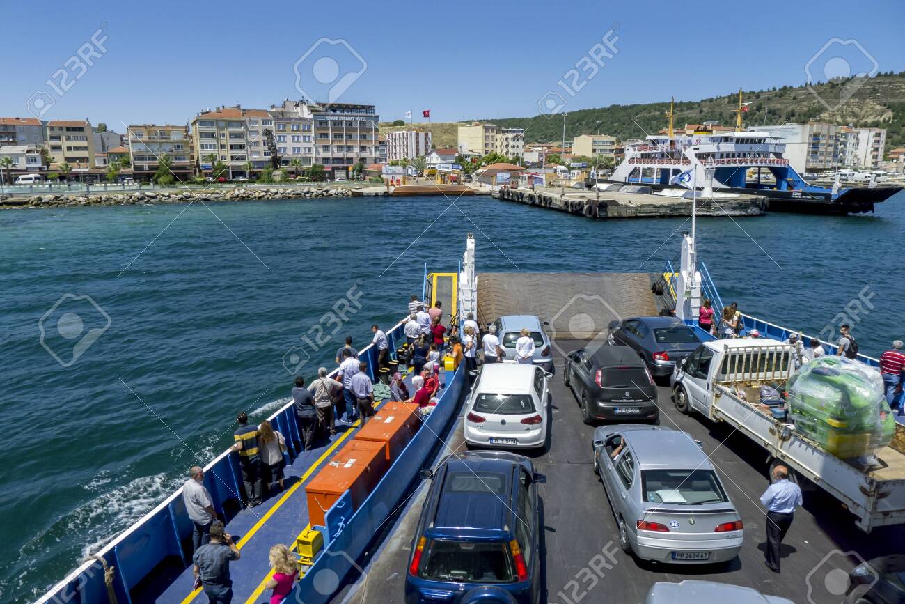 A Ferry Boat Loaded With Cars And Trucks Approaches The Port Stock Photo Picture And Royalty Free Image Image