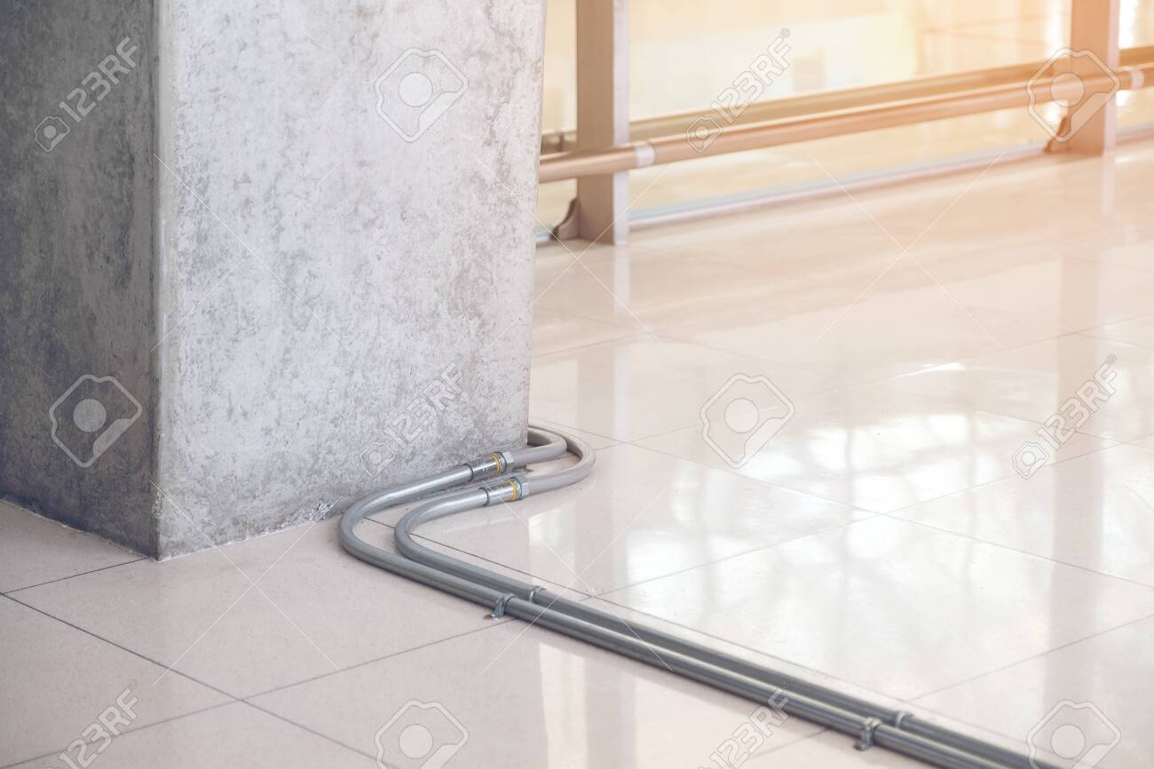 Electric Cable Pipe Or Conduit Fixing On The Concrete Floor Construction Work Wiring System Installation Inside The Building Stock Photo Picture And Royalty Free Image Image 123904548