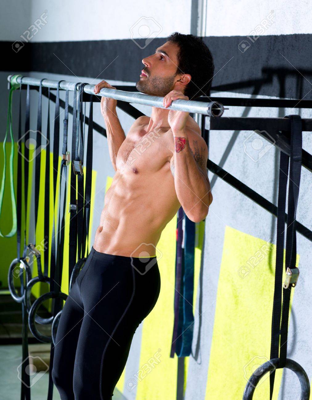 crossfit toes to bar man pull ups 2 bars workout exercise at stock