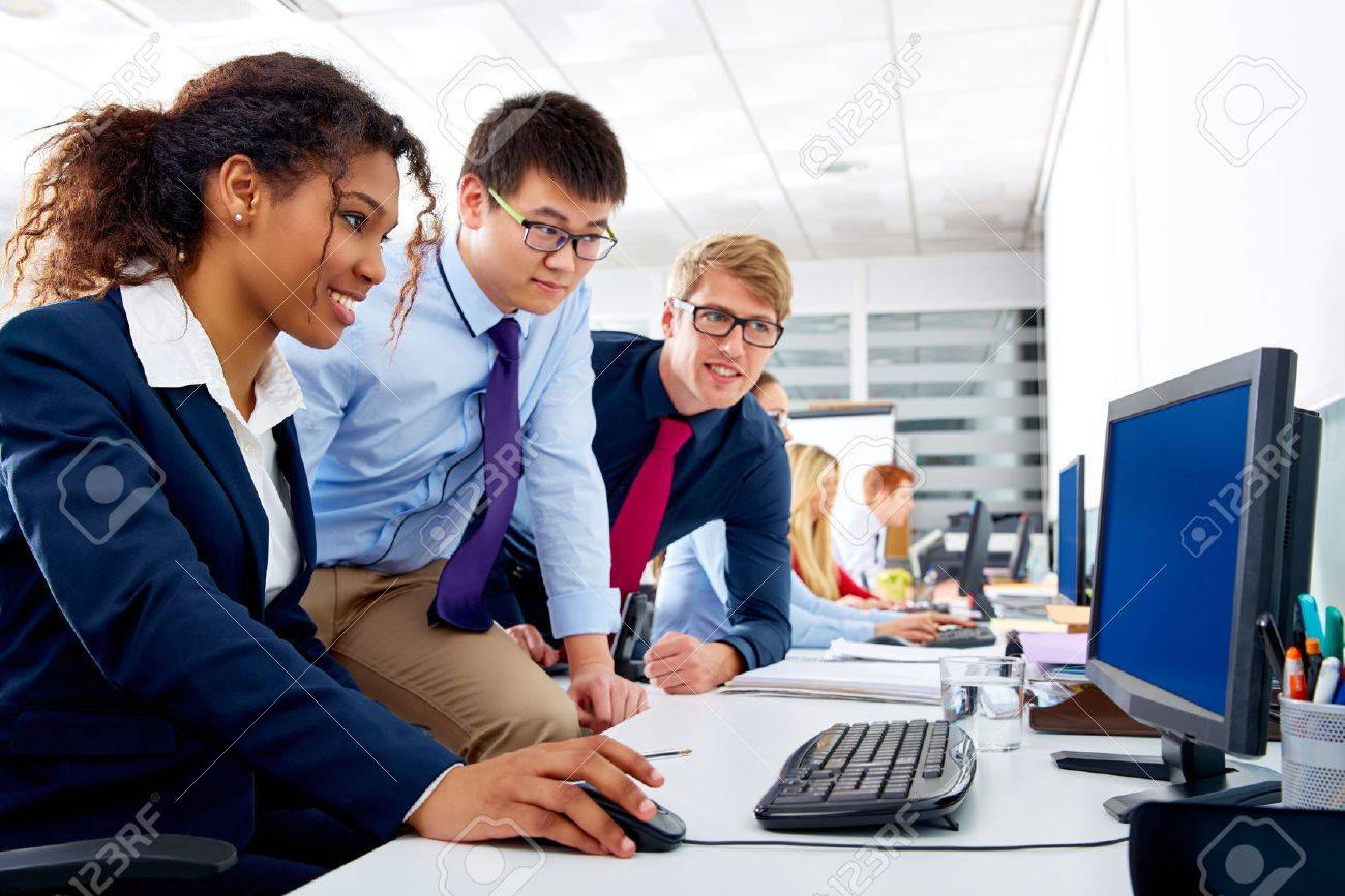 business team young people multi ethnic teamwork in office computer business computer