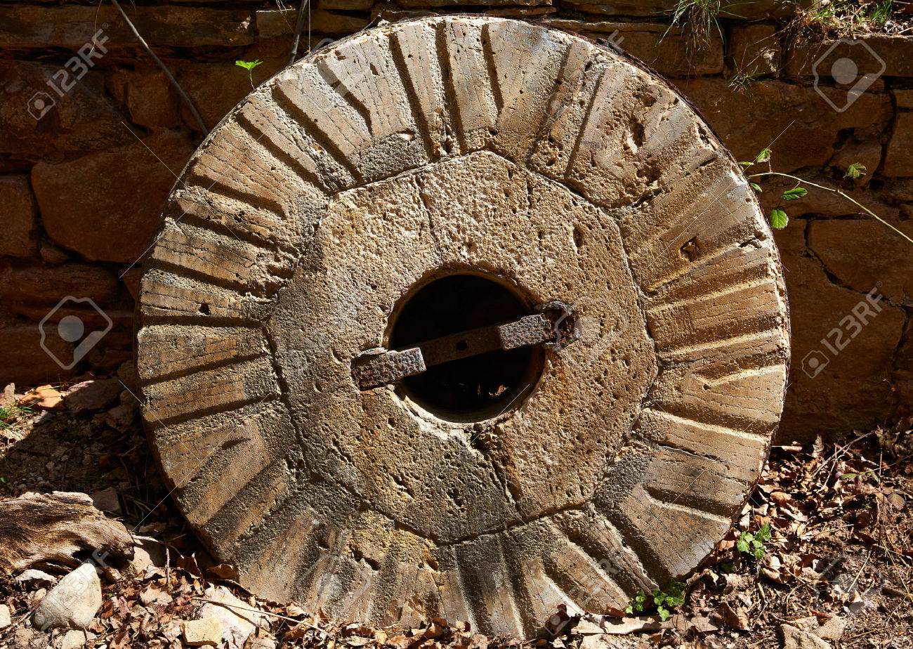 Aged old mill millwheel stone wheel in Cuenca Spain - 41346855 Aged old mill millwheel stone wheel in Cuenca Spain - 41346855