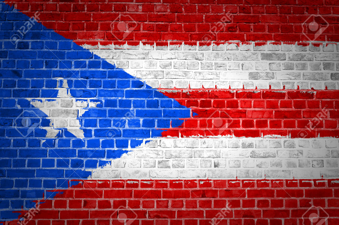 An Image Of The Puerto Rico Flag Painted On A Brick Wall In An