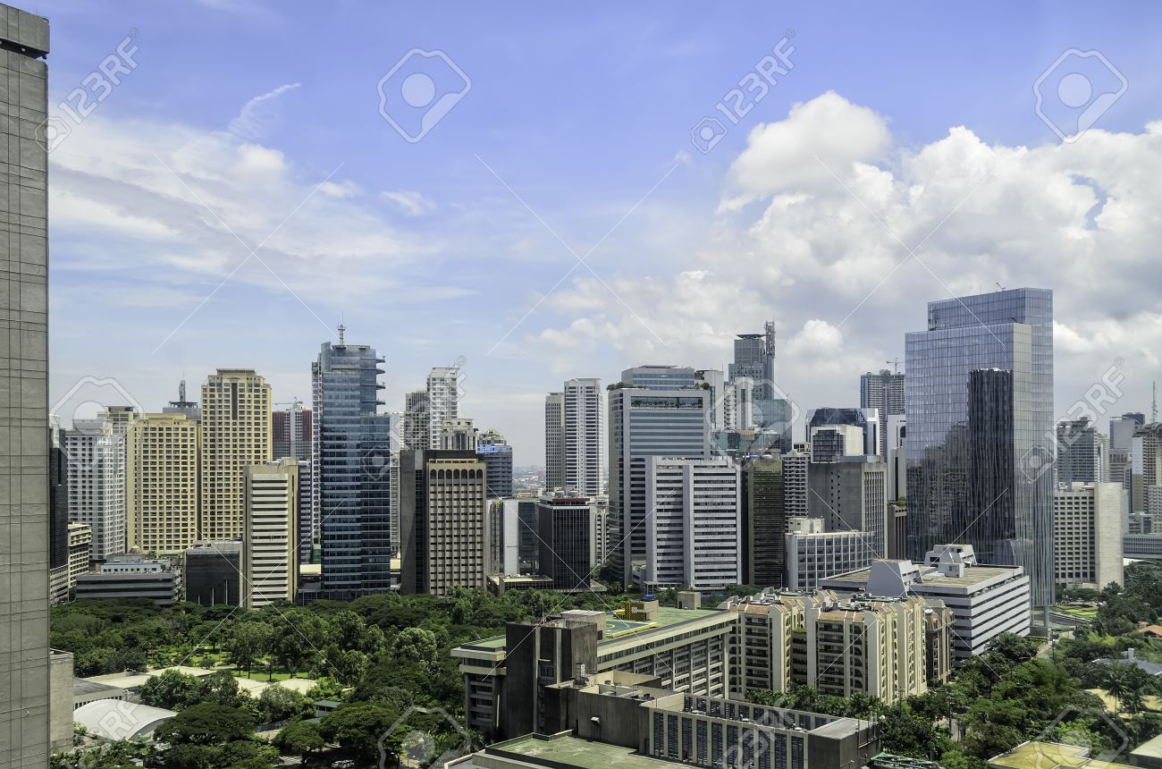 mix of old and modern urban buildings in makati city manila