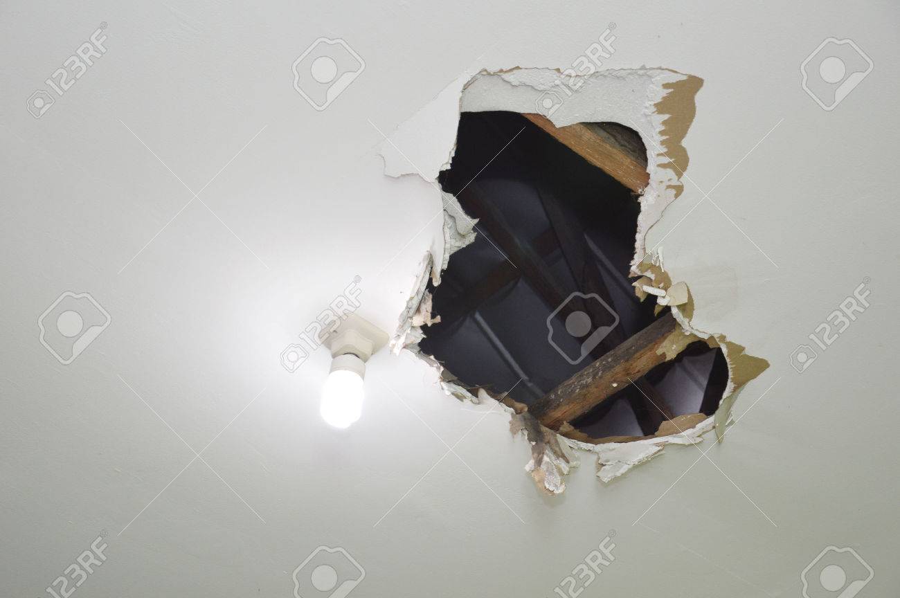 Hole On The Ceiling Stock Photo Picture And Royalty Free Image