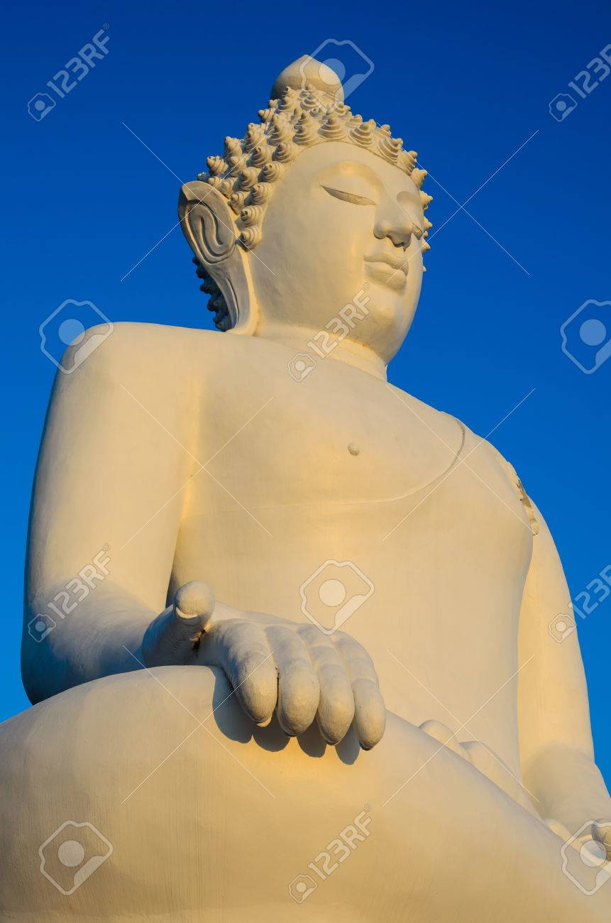 30464705-white-budda-and-blue-sky-in-the-evening-light.jpg