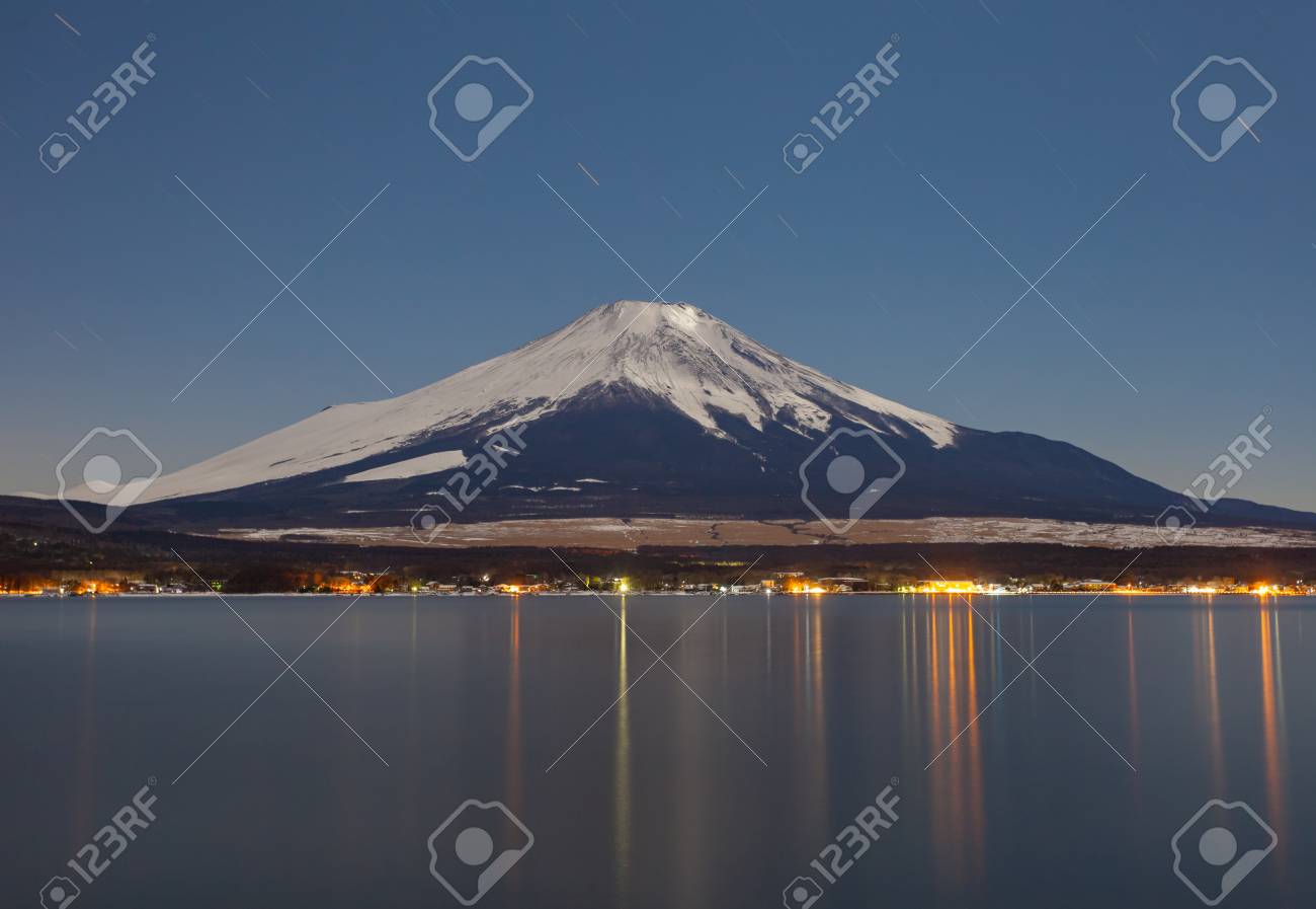 Mount Fuji With Moonlight At Lake Yamanakako In Winter Stock Photo Picture And Royalty Free Image Image 80082250