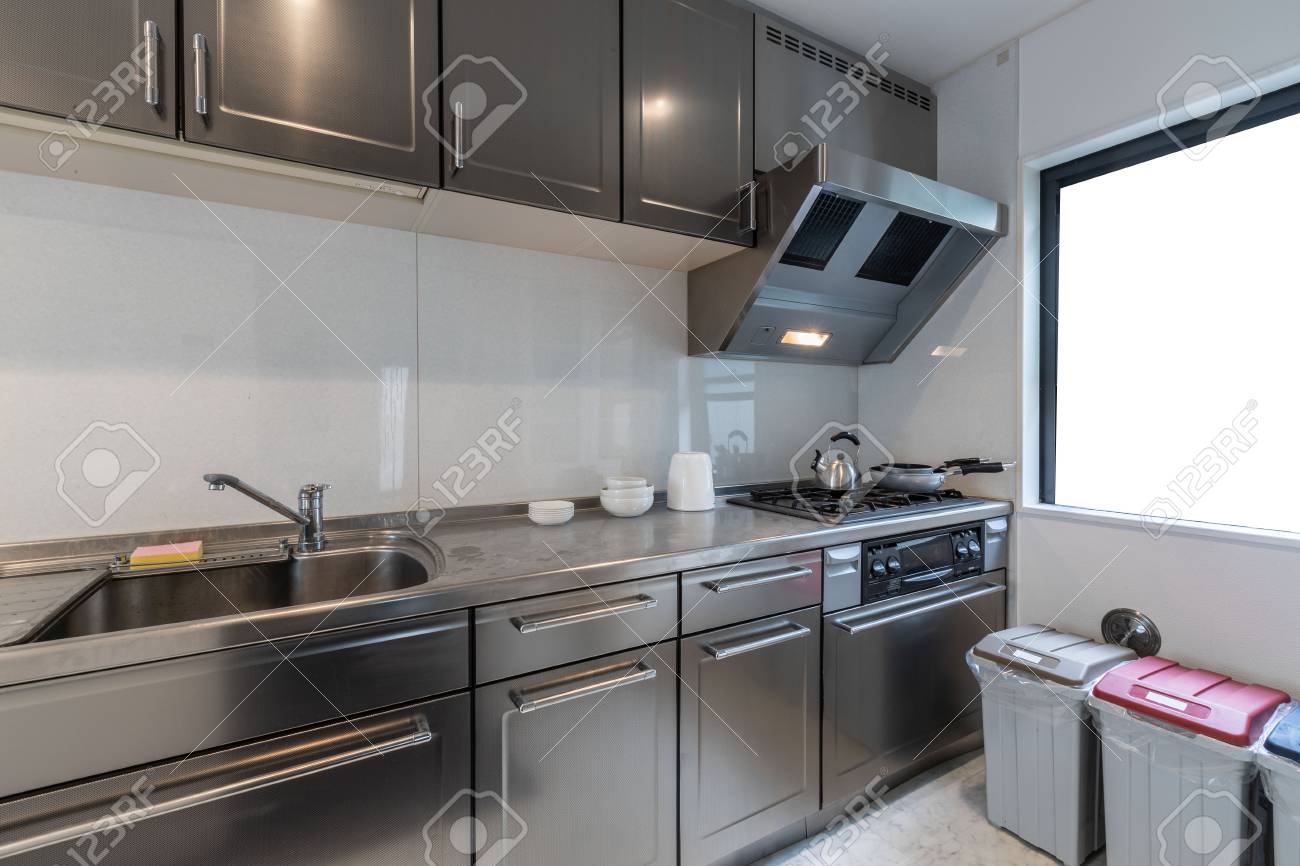 Modern Kitchen With Stainless Steel Kitchen Cabinets Stock Photo