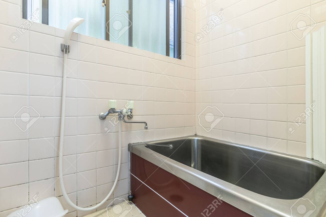 Old Style Stainless Steel Bathtub In A 