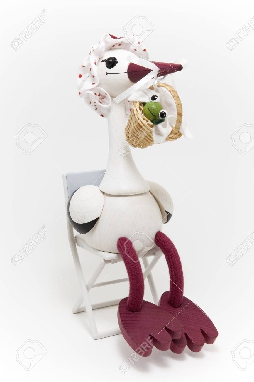 doll sitting in chair
