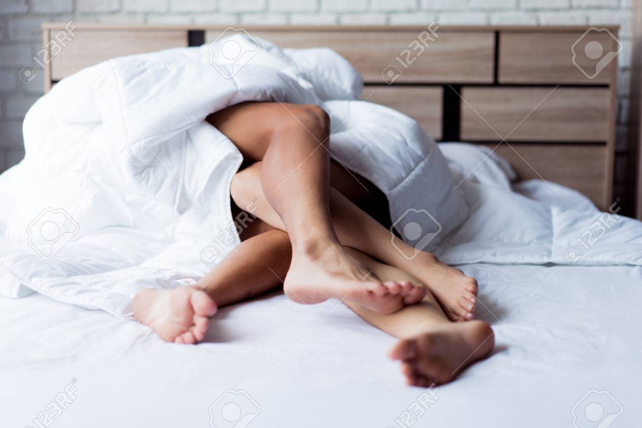 Close up of passionate young asian couple having on bed.They are tired of sex. - 119655923 Close up of passionate young asian couple having on bed.They are tired of sex. - 119655923