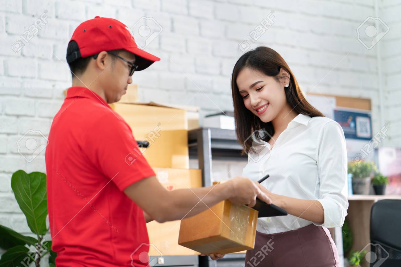 business woman receiving a parcel - 123514057 business woman receiving a parcel - 123514057