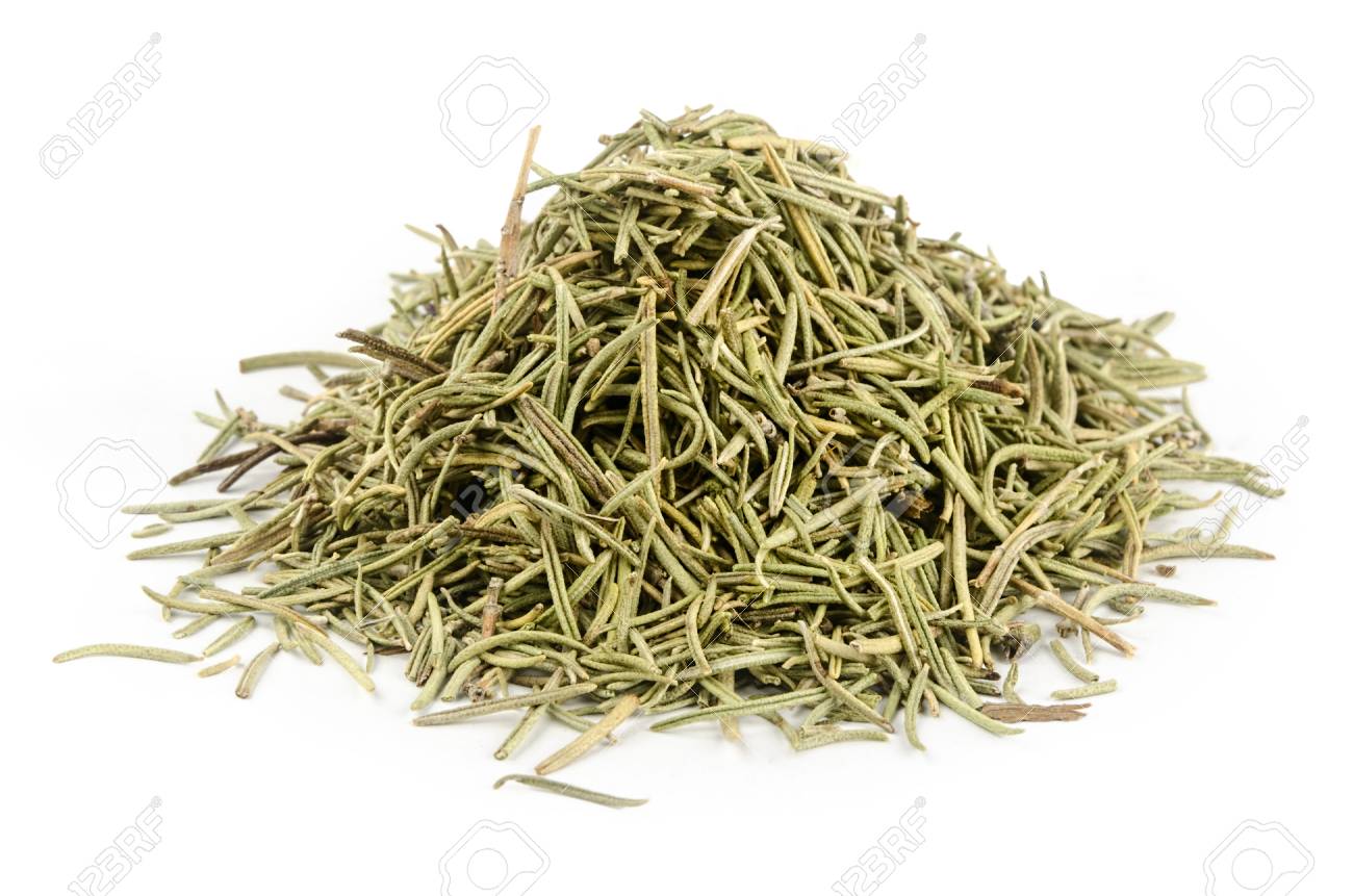 dried rosemary leaves or needles isolated over white stock photo