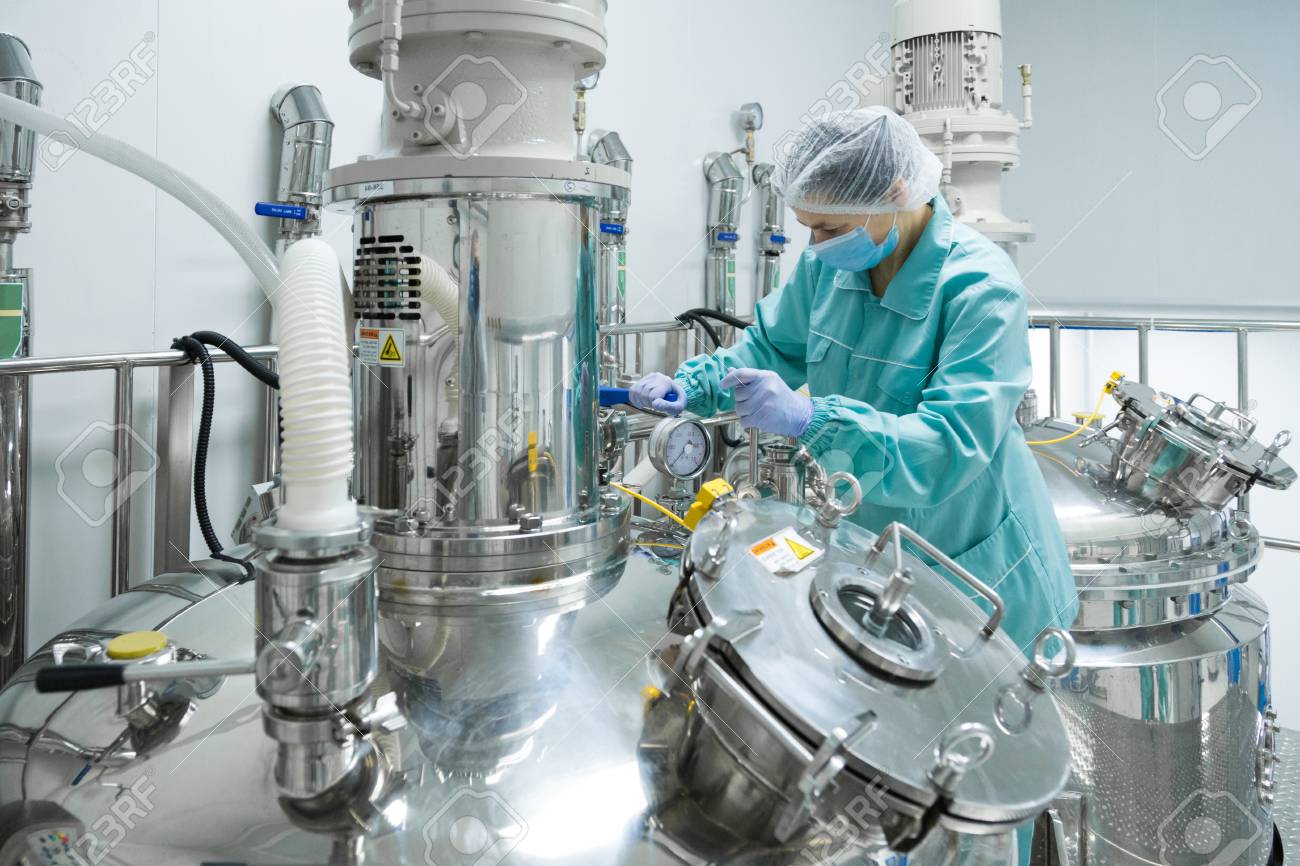 Pharmaceutical Technician In Sterile Environment At Pharmacy.. Stock Photo,  Picture And Royalty Free Image. Image 98006651.