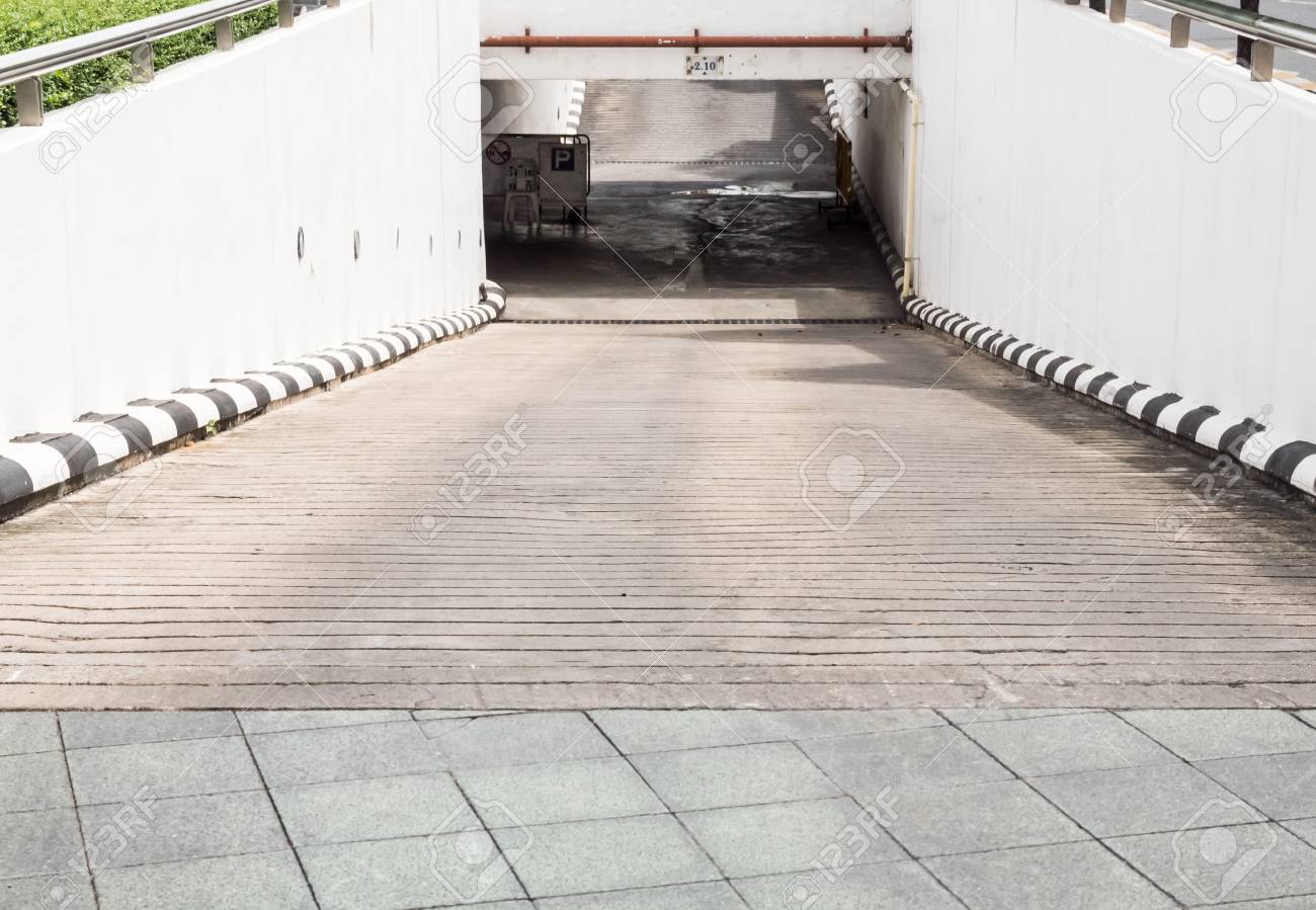 Concrete Slope Way To The Underground Parking Building Of The Urban Park.  Stock Photo, Picture and Royalty Free Image. Image 66153929., image size:1300x899
