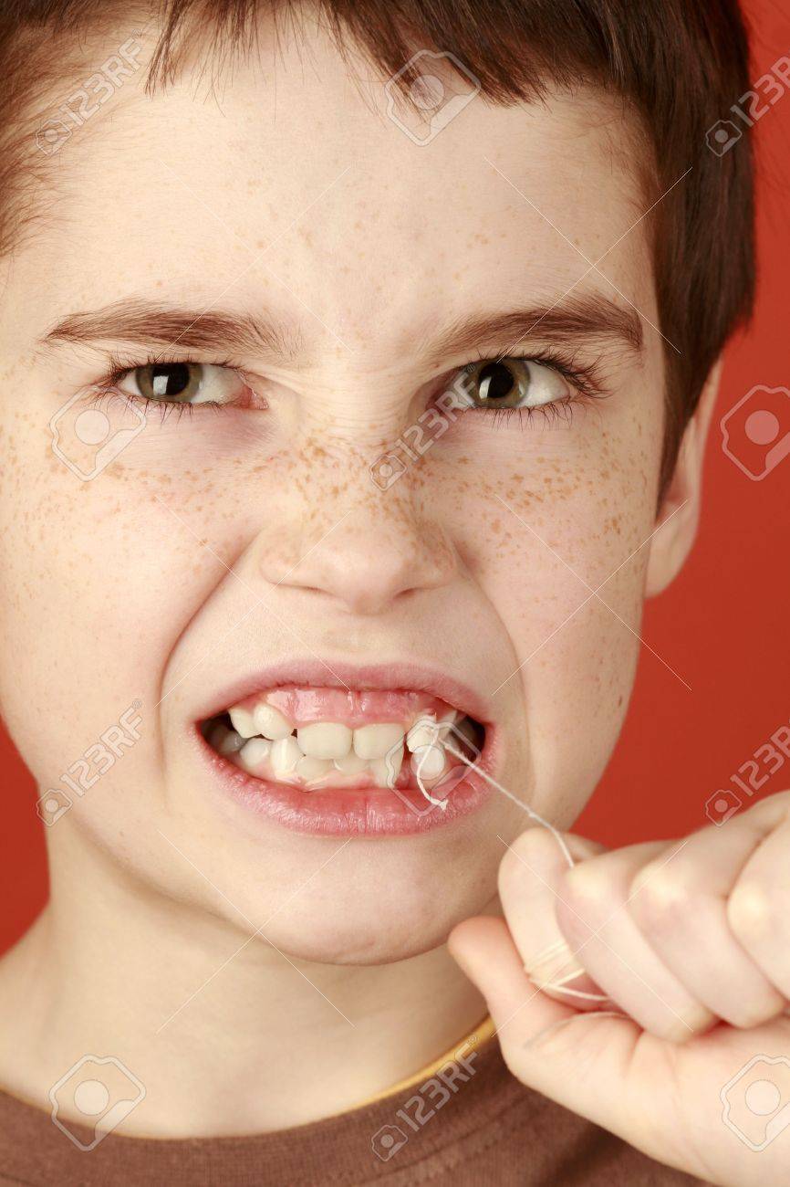 Lost Healthy Milk Tooth Young Tough Boy Pulling A Tooth Out Piercing Toothache Stock Photo Picture And Royalty Free Image Image