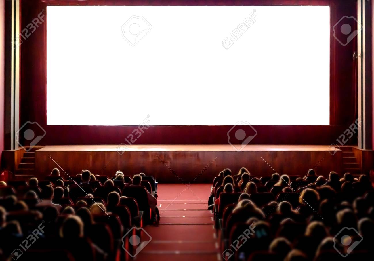 People in the cinema auditorium with empty white screen. - 118790748 People in the cinema auditorium with empty white screen. - 118790748