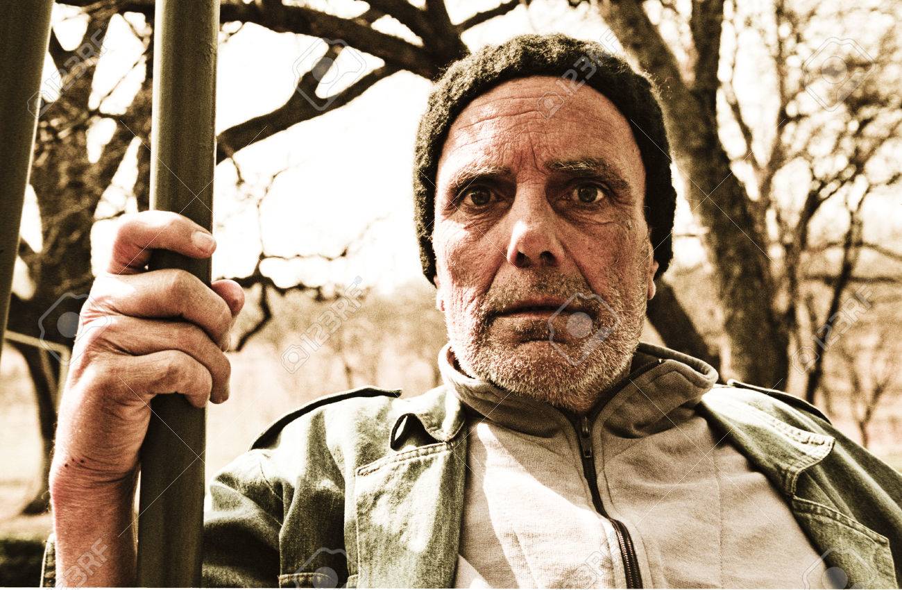 https://previews.123rf.com/images/travelmaster/travelmaster1609/travelmaster160900374/62636600-an-elderly-man-holds-on-to-a-pole-staring-into-the-camera-blankly-looking-tired-and-haggard.jpg