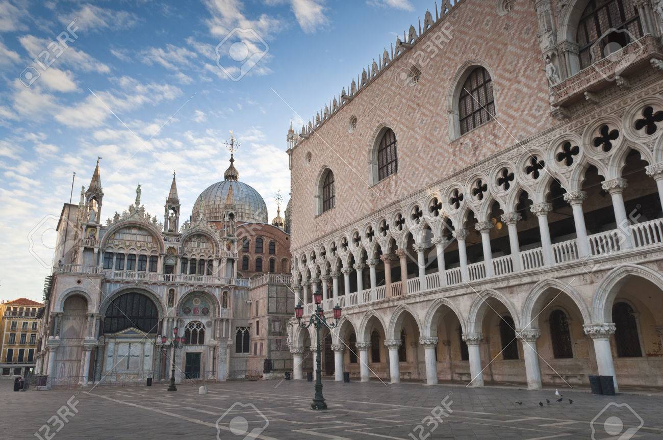 Stock Photo - Warm early morning light on the stunning renaissance (14th and 15th century) architecture in St Mark's Square, Venice. Doges Palace, Campanile ...