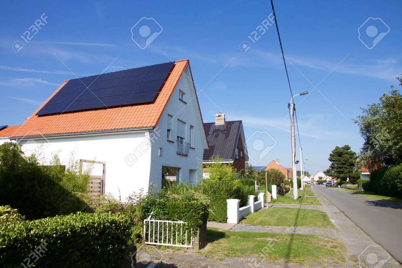 Photovoltaics on the roof of a residential building for alternative energy production - 77370200 Photovoltaics on the roof of a residential building for alternative energy production - 77370200