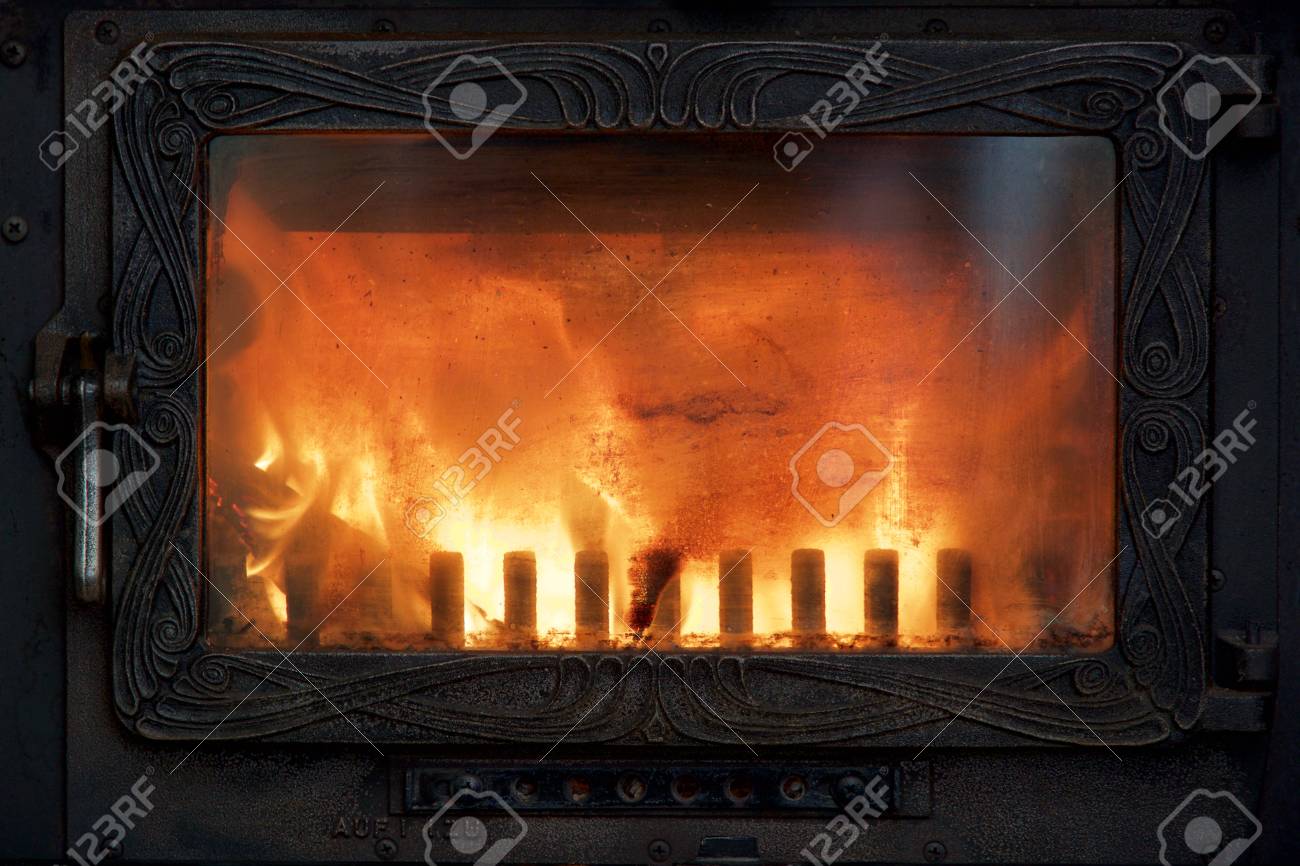 Cozy fire in the stove for a comfortable warm house in winter - 81602220 Cozy fire in the stove for a comfortable warm house in winter - 81602220
