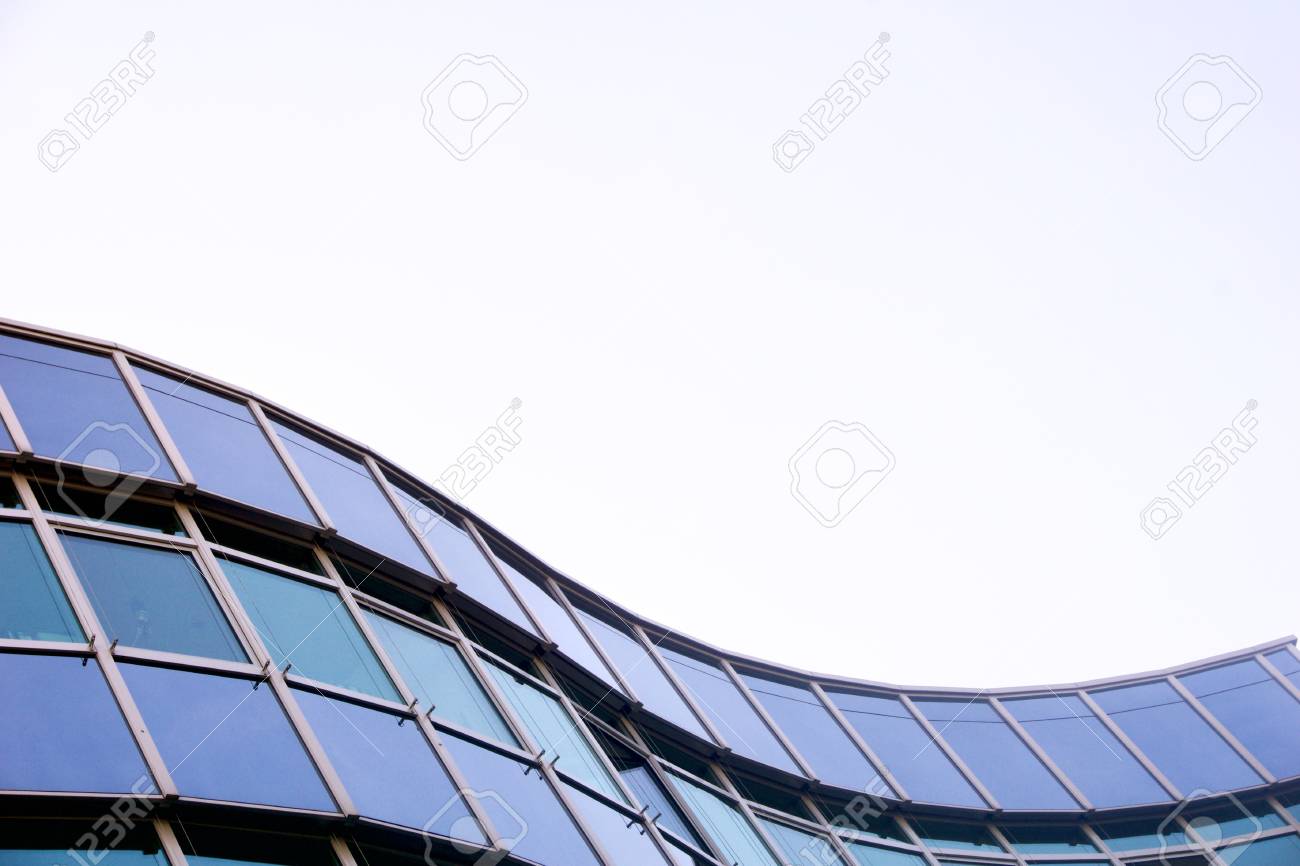 Office building against a blue sky with copyspace - 83652089 Office building against a blue sky with copyspace - 83652089