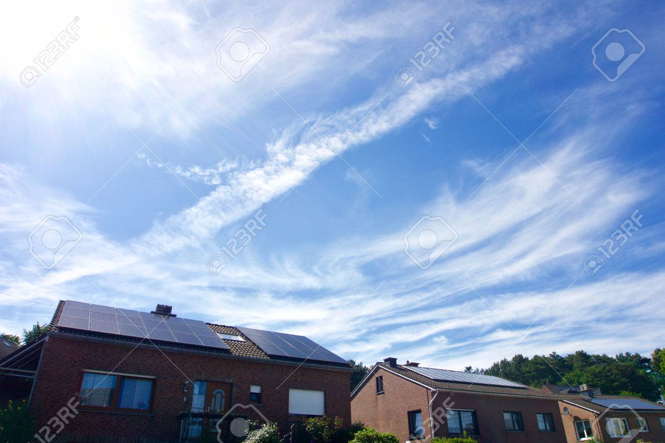 Photovoltaic panels on the roof of a residential building with copyspace - 85551835 Photovoltaic panels on the roof of a residential building with copyspace - 85551835