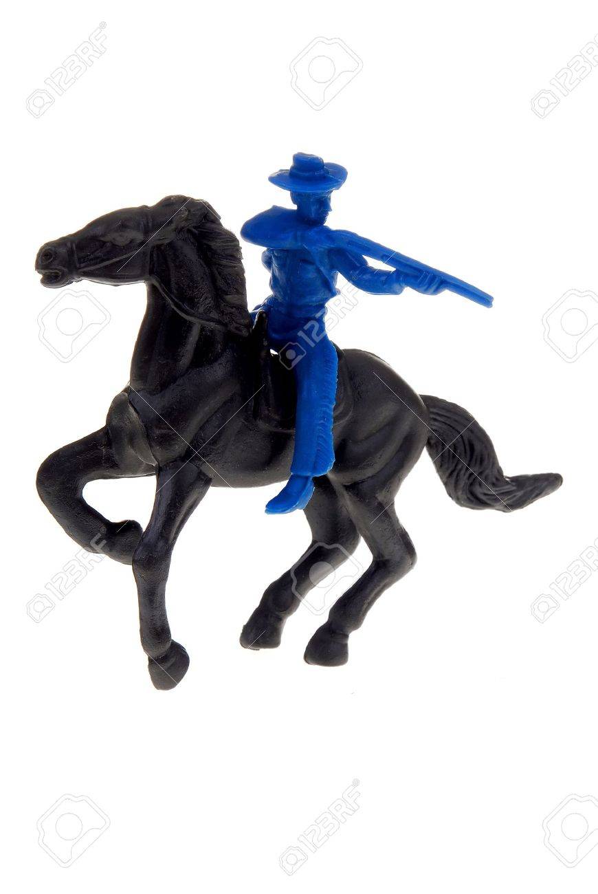 toy cowboys and horses
