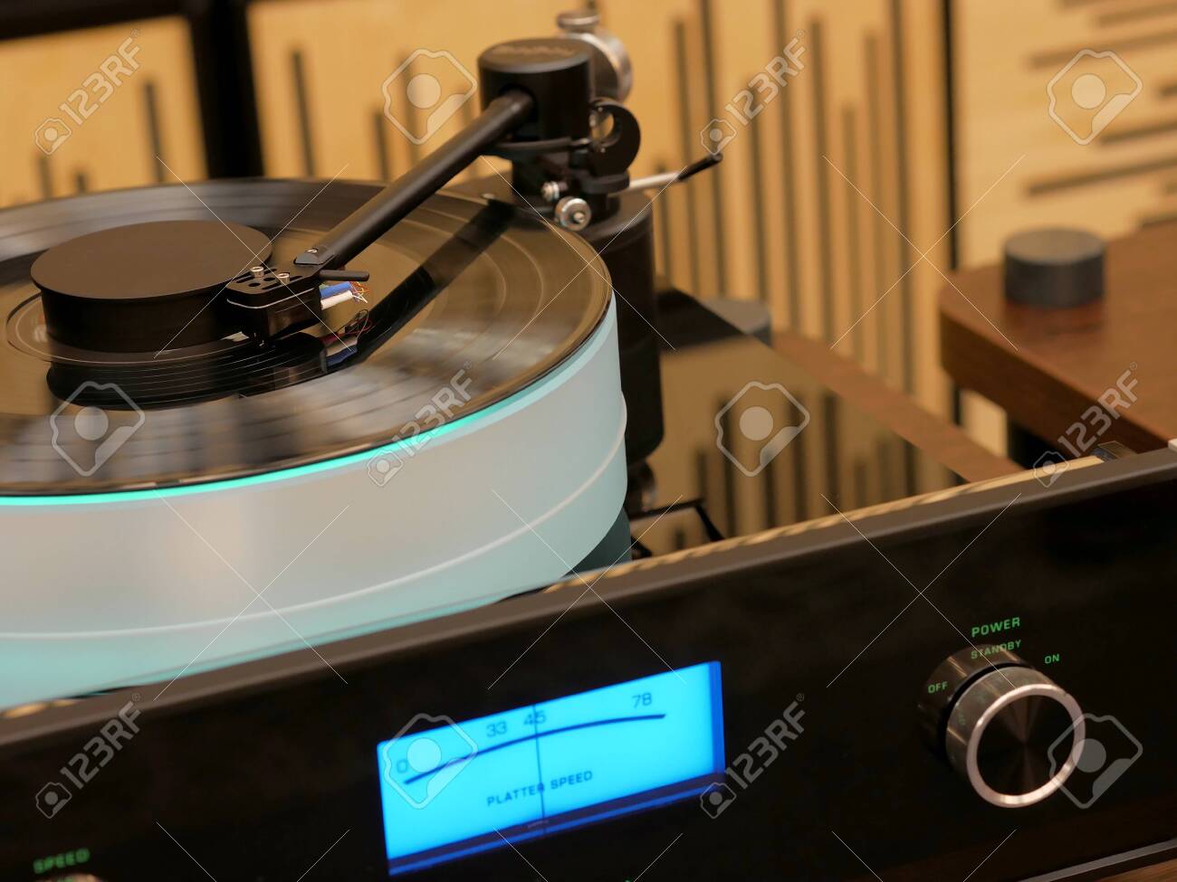 Audiophile turntable with vinyl record. Retro analog audio equipment for HiFi luxury sound system. Listen to the music in great quality with vintage turntables. - 141278916 Audiophile turntable with vinyl record. Retro analog audio equipment for HiFi luxury sound system. Listen to the music in great quality with vintage turntables. - 141278916