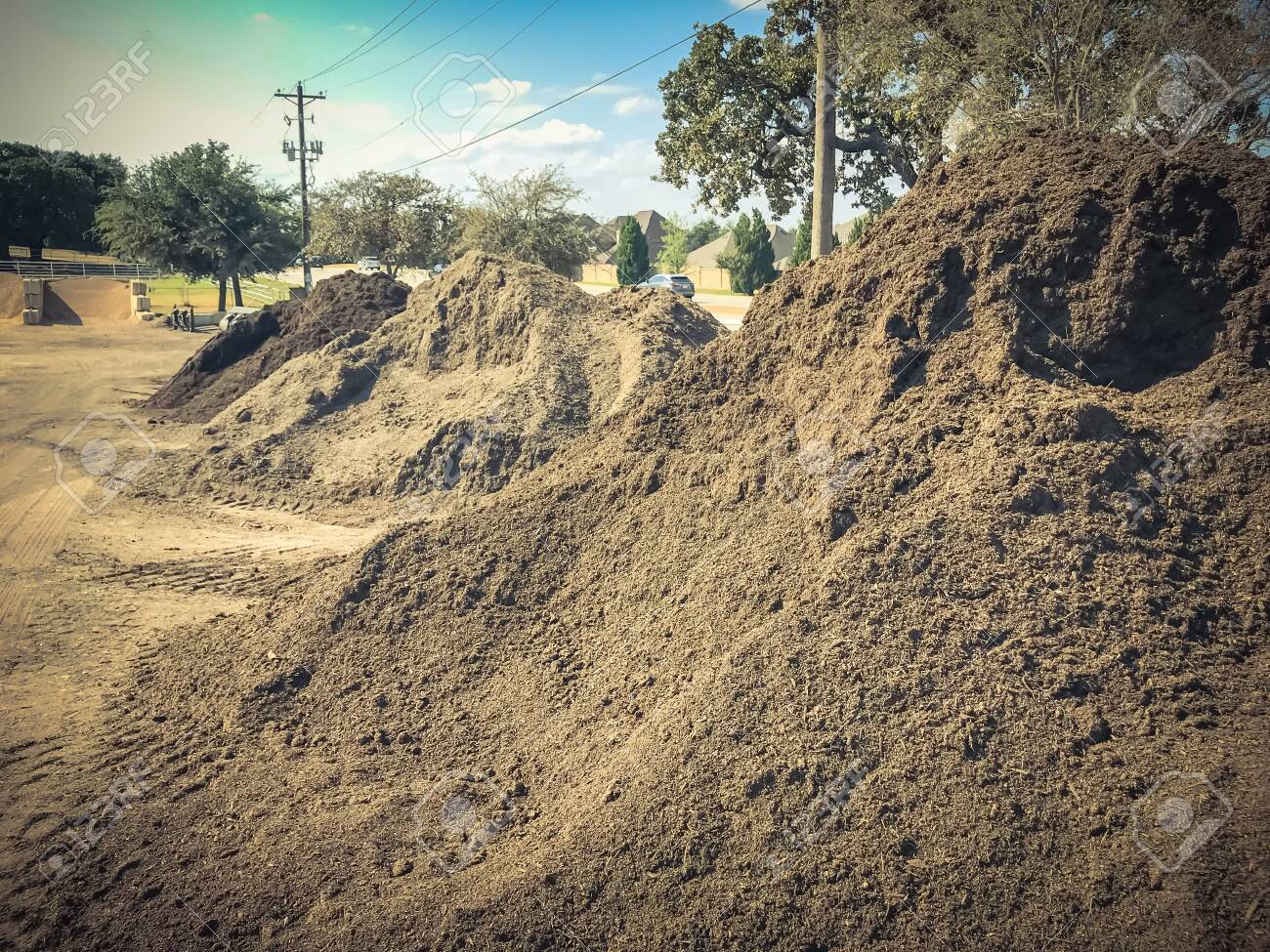 Giant Pile Of Compost Mulch Sand Gravel Soil Stone For Bulk Sale Locally Sourced And Blended Organic Feed Stocks Landscape And Gardening Materials Wholesaler Near Dallas Texas Usa Stock Photo Picture And