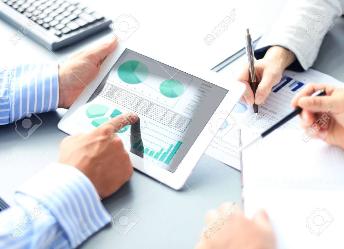 Image of human hand pointing at touchscreen in working environment at meeting - 44557805 Image of human hand pointing at touchscreen in working environment at meeting - 44557805