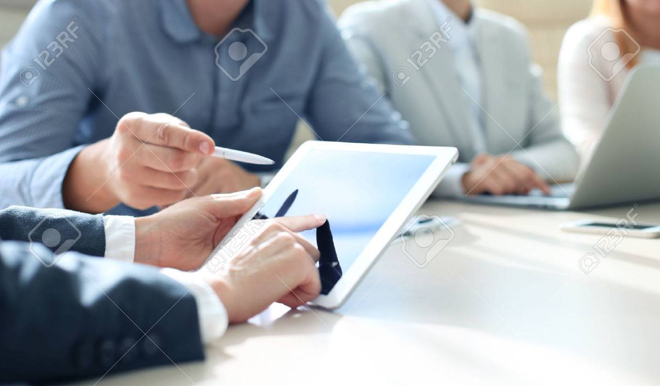 Business adviser analyzing financial figures denoting the progress in the work of the company - 45261593 Business adviser analyzing financial figures denoting the progress in the work of the company - 45261593
