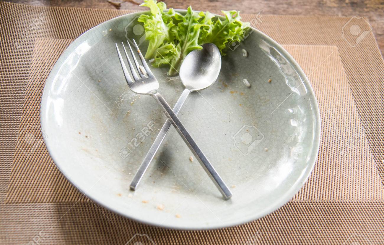 Empty Plate After Food On Wood Stock Photo, Picture And Royalty Free Image.  Image 42963316.