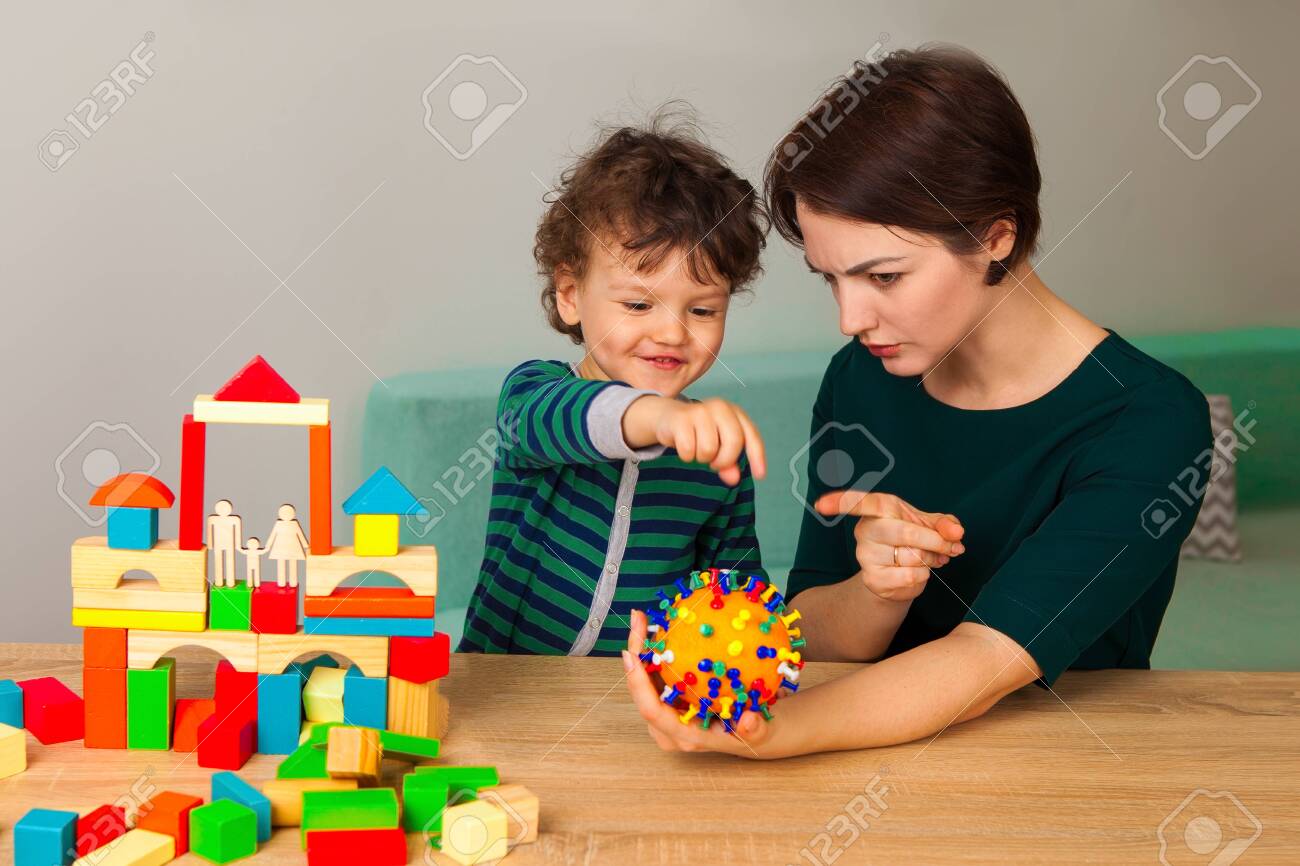 Stay Home Mom And Baby Play At Home Explain To The Child What Stock Photo Picture And Royalty Free Image Image 151321789