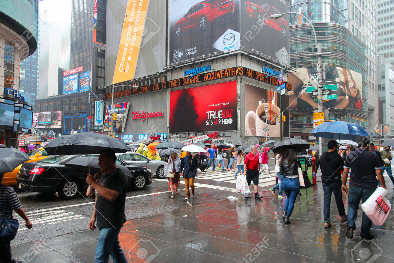 New York Usa June 10 2013 People Walk In Rain In Times Square