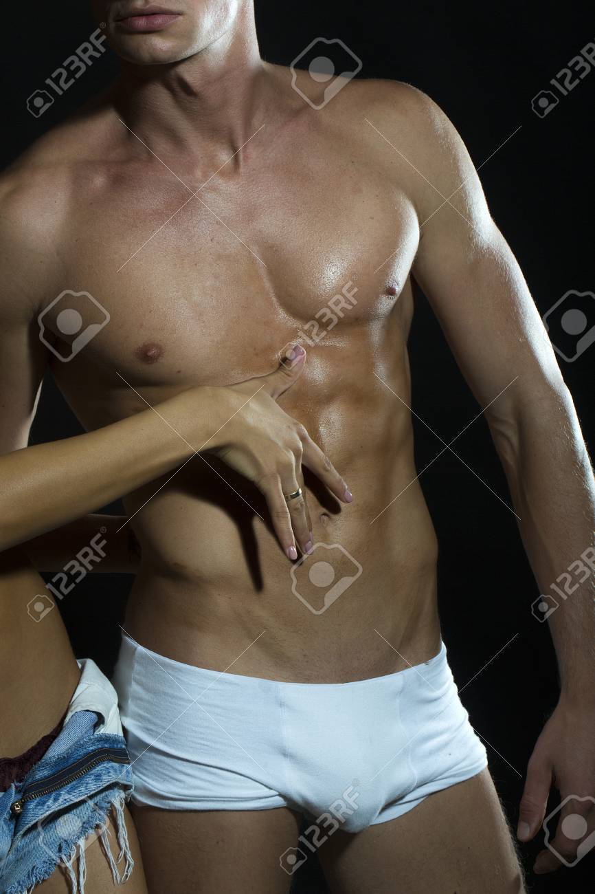 touching naked boys Sexual Young Naked Pair Of Muscular Boy In White Underwear And Girl In  Jeans Shorts Touching Male Torso With Hand Standing Close To Each Other In  Studio On Black Background, Vertical Photo