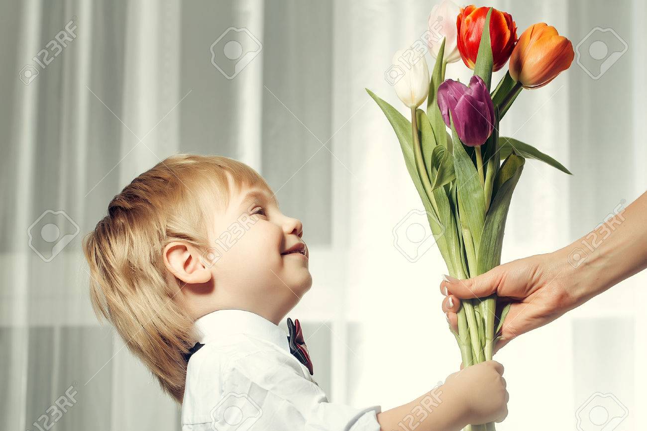 Happy Smiling Cute Little Boy Gentleman With Blonde Hair In White
