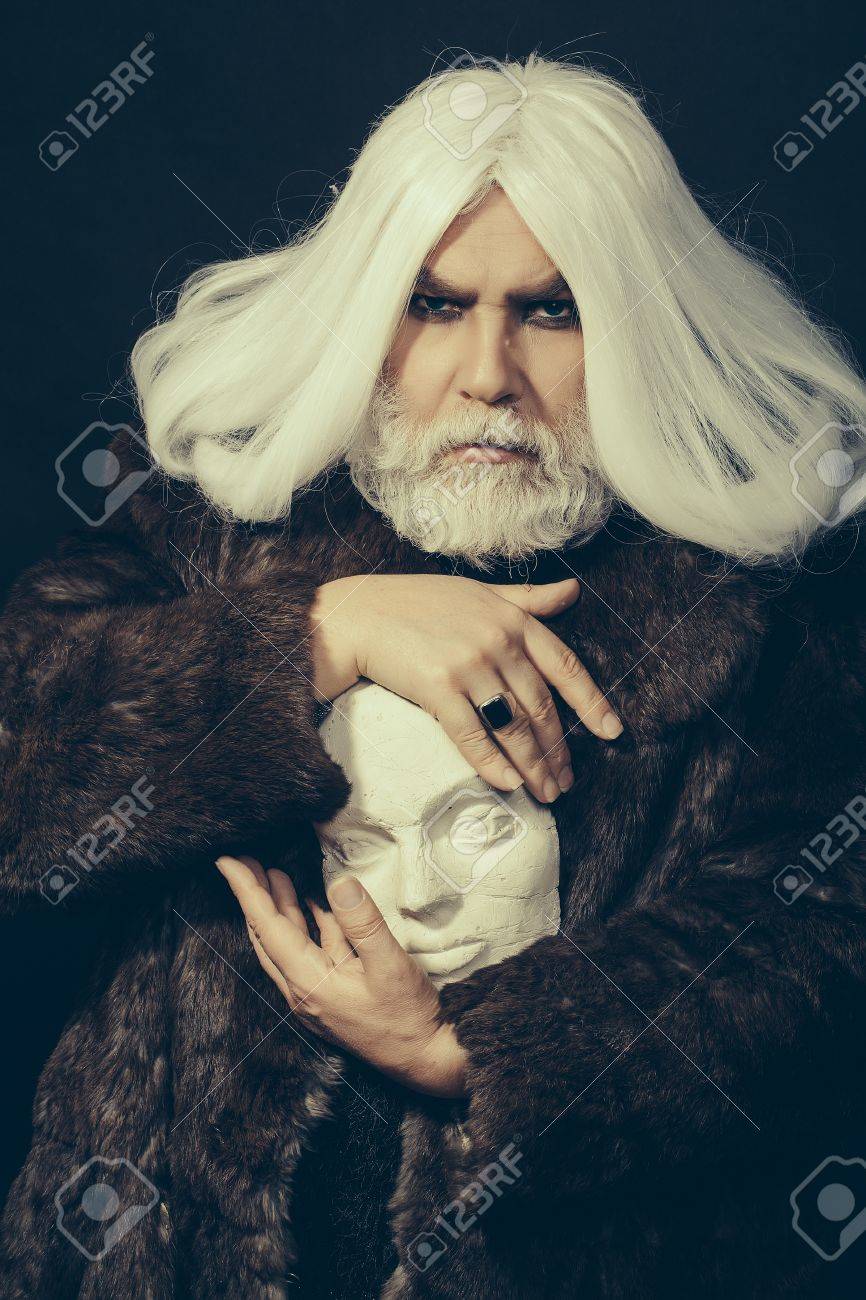 Old Druid Bearded Man With Long Beard On Serious Face And Hair