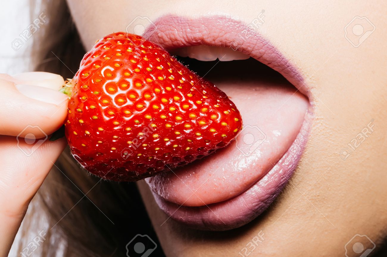 Sexy Female Mouth With Pink Lipstick On Lips Eating And Licking With Tongue Red Sweet Strawberry Sexy Female Mouth With Pink Lipstick On Lips Eating And Licking With Tongue Red Sweet Strawberry