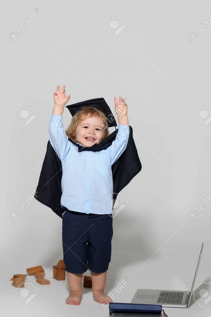 Small Boy Child With Long Blond Hair In Blue Shirt Black Graduation