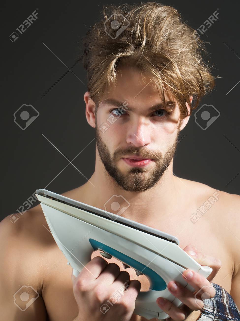 Sexy Naked Handsome Man With Messy Hair And Beard Holds White